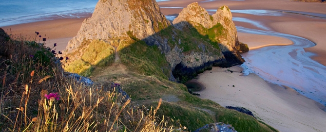 Three Cliffs Bay on the Gower peninsula - one of the Areas of Outstanding Natural Beauty (AONBs) on the Wales Coast Path